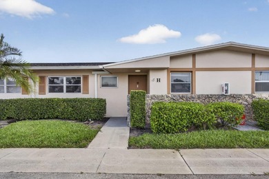 Welcome to this beautifully remodeled 2-bed, 2-bath villa - photo 1