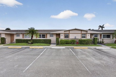 Welcome to this beautifully remodeled 2-bed, 2-bath villa - photo 2
