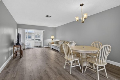Welcome to this beautifully remodeled 2-bed, 2-bath villa - photo 9