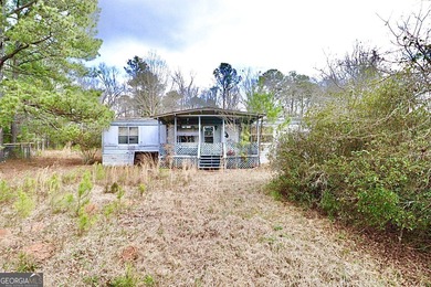 Tussahaw Reservoir Home Sale Pending in Locust Grove Georgia