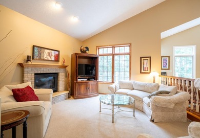 This unique custom-designed home features an open floor plan - photo 7