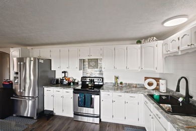 Wake up to breathtaking panoramic views of Herrington Lake from - photo 25