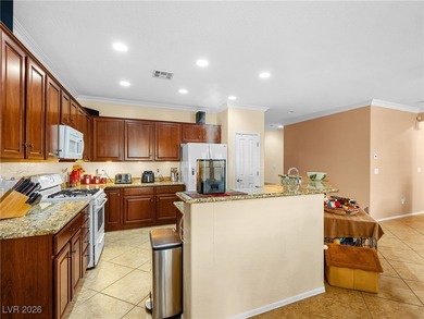 Located in award-winning Sun City Aliante community, this