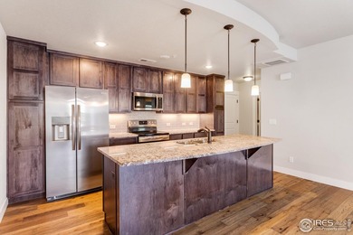 This upgraded first floor condo delivers effortless, single