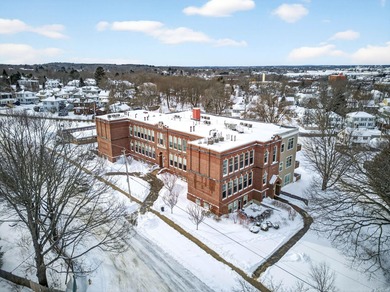 Filled with light, this end-unit condo feels like a private