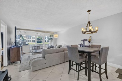 Welcome to this FIRST FLOOR, 2-bedroom, 2-bathroom condominium - photo 2
