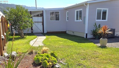 MOTIVATED SELLER! Relaxed lifestyle on the coast... This - photo 4