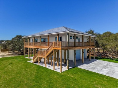 Southern architecture coupled with Texas Coastal vibes. New - photo 1