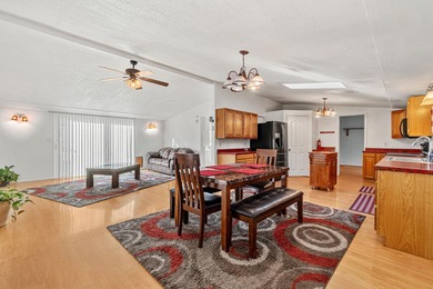 Welcome home to this charming 3-bedroom, 2-bath mobile home - photo 2