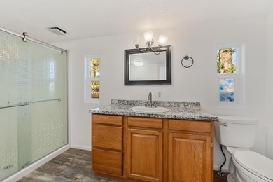 Welcome home to this charming 3-bedroom, 2-bath mobile home - photo 8
