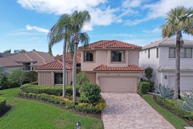 Lake Home For Sale in Palm Beach Gardens, Florida