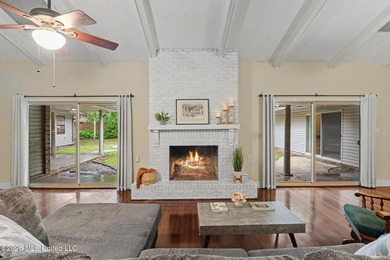 Situated on a quiet cul-de-sac in the heart of Diamondhead, this - photo 3