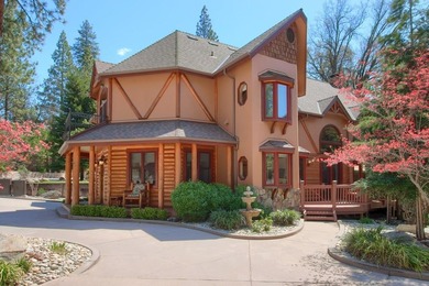 Experience mountain elegance and lake living in this custom 3 - photo 1