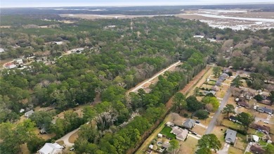 Discover the potential of this unique 4.96-acre residential - photo 4