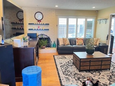 Charming home in a desirable neighborhood, featuring a gated - photo 3