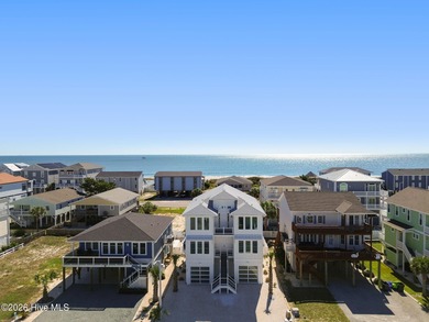 Step into coastal luxury with this furnished beach home that