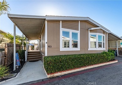 Boasting a rare, extra-large yard with a great grass area, this - photo 1