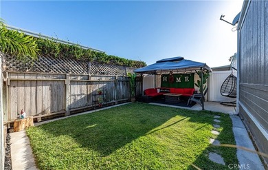 Boasting a rare, extra-large yard with a great grass area, this - photo 5