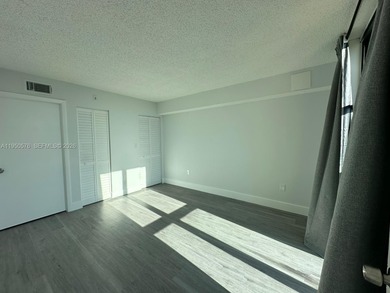 This beautifully and completely updated top floor, split bedroom