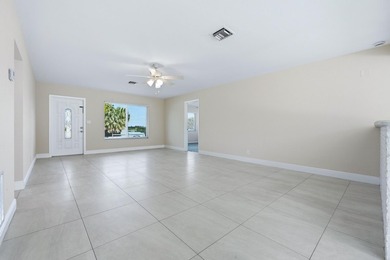 Lakefront living at its finest! Enjoy breathtaking panoramic - photo 7
