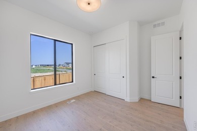 New construction ranch in Windsor's Greenspire at Windsor Lake - photo 11