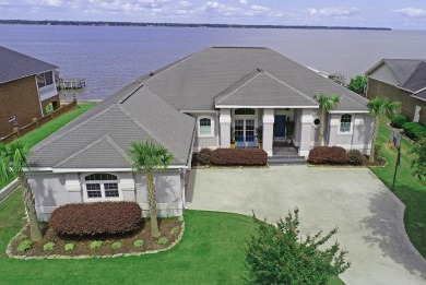 This gated golf course neighborhood is just 50 minutes North of - Lake Home Under Contract in Santee, South Carolina