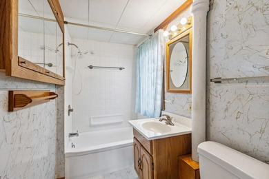 Bring your vision to this charming lakefront home on beautiful - photo 13