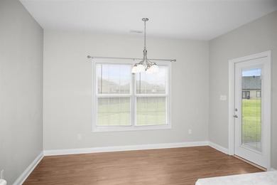 Welcome to Woodland Ridge! Built in 2022, this thoughtfully - photo 14