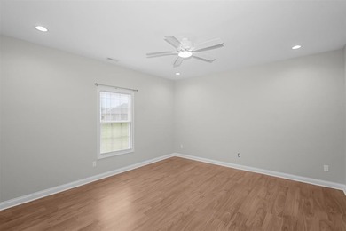 Welcome to Woodland Ridge! Built in 2022, this thoughtfully - photo 16