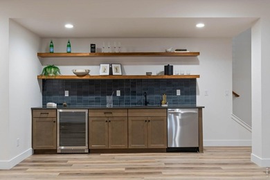 This custom-designed ranch-style home blends elevated finishes - photo 22
