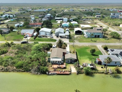 Don't miss this canal-front, Texas gem in Copano Cove. Framed by - photo 22
