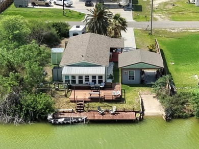 Don't miss this canal-front, Texas gem in Copano Cove. Framed by - photo 23