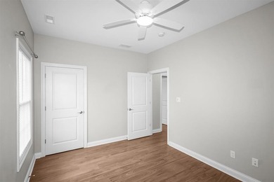 Welcome to Woodland Ridge! Built in 2022, this thoughtfully - photo 28