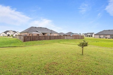 Welcome to Woodland Ridge! Built in 2022, this thoughtfully - photo 32