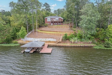 Welcome to 240 Shagbark Lane! This is a luxury lake front home - Lake Home For Sale in Sparta, Georgia