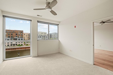 River and skyline views set the tone from your private balcony - photo 8