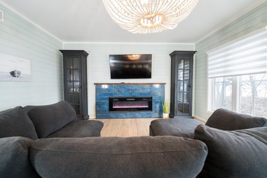 Stunning lake view luxury estate with dual living potential! - photo 9