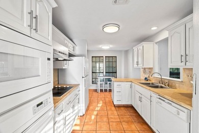 A home that truly meets every need and desire. Situated on - photo 8
