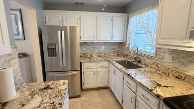Wellmaintained 2ndfloor corner unit with a bright convertible - photo 12