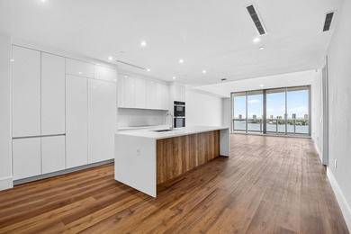 Indulge in the elegance of resort-style waterfront living in - photo 3