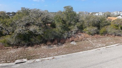 Nestled along the tranquil shoreline of a small private lake in - photo 2