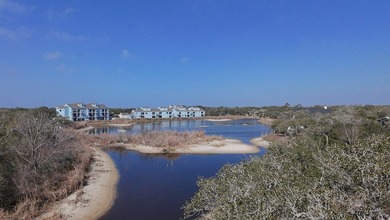 Nestled along the tranquil shoreline of a small private lake in - photo 6