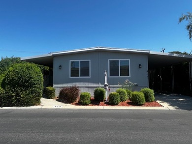 This 2-bedroom, 2-bathroom home features an additional pop-out - photo 1