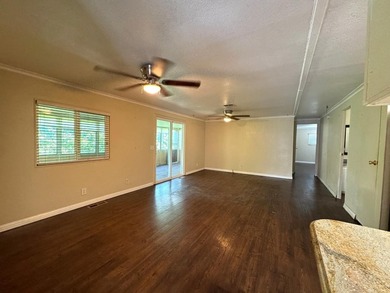 This 2-bedroom, 2-bathroom home features an additional pop-out - photo 2