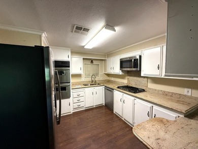 This 2-bedroom, 2-bathroom home features an additional pop-out - photo 3