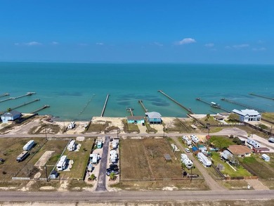 This beautiful 0.25-acre lot offers stunning views of Copano Bay - photo 1