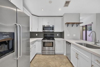 Beautifully updated and move-in ready, this charming villa is - photo 3