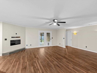 Welcome to this gorgeous 4 bedroom, 2.5 bathroom all-brick ranch