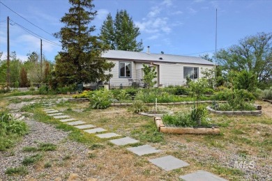 Lake Home For Sale in West Magic, Idaho