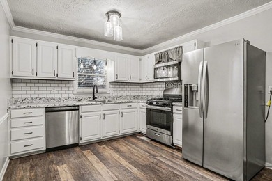 **MOVE-IN READY - BRAND NEW HVAC!** This home is ideally located